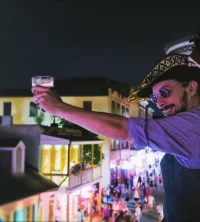 Laissez les bons temps roule! Haave a drink on bourbon's street famous balconies.